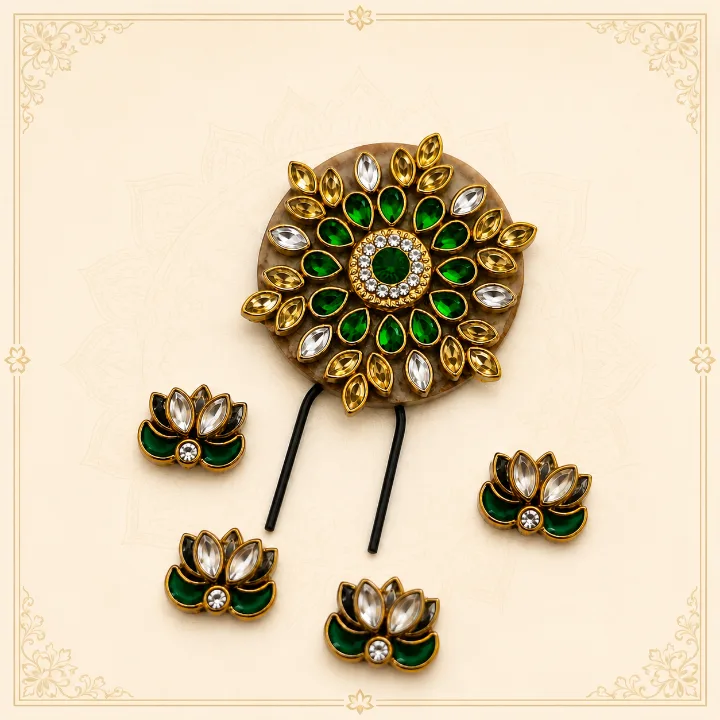 Handmade floral hair accessory set with emerald green and gold lotus-inspired hair pins on a cream background.
