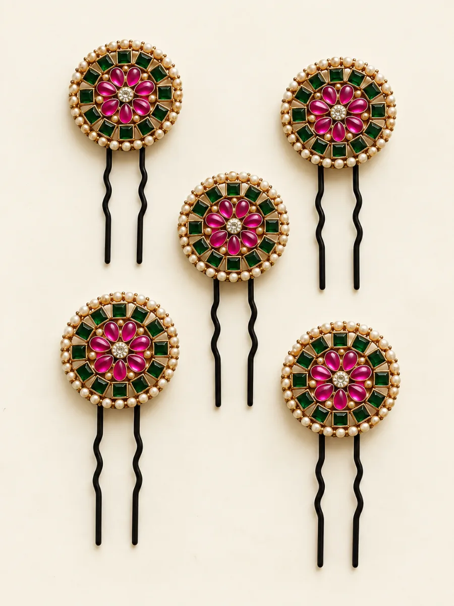 Emerald & Magenta Floral Kundan Hair Pins — Elegant handmade hair pins featuring a floral design with emerald-green and magenta accents, pearl detailing, and black wavy pins.