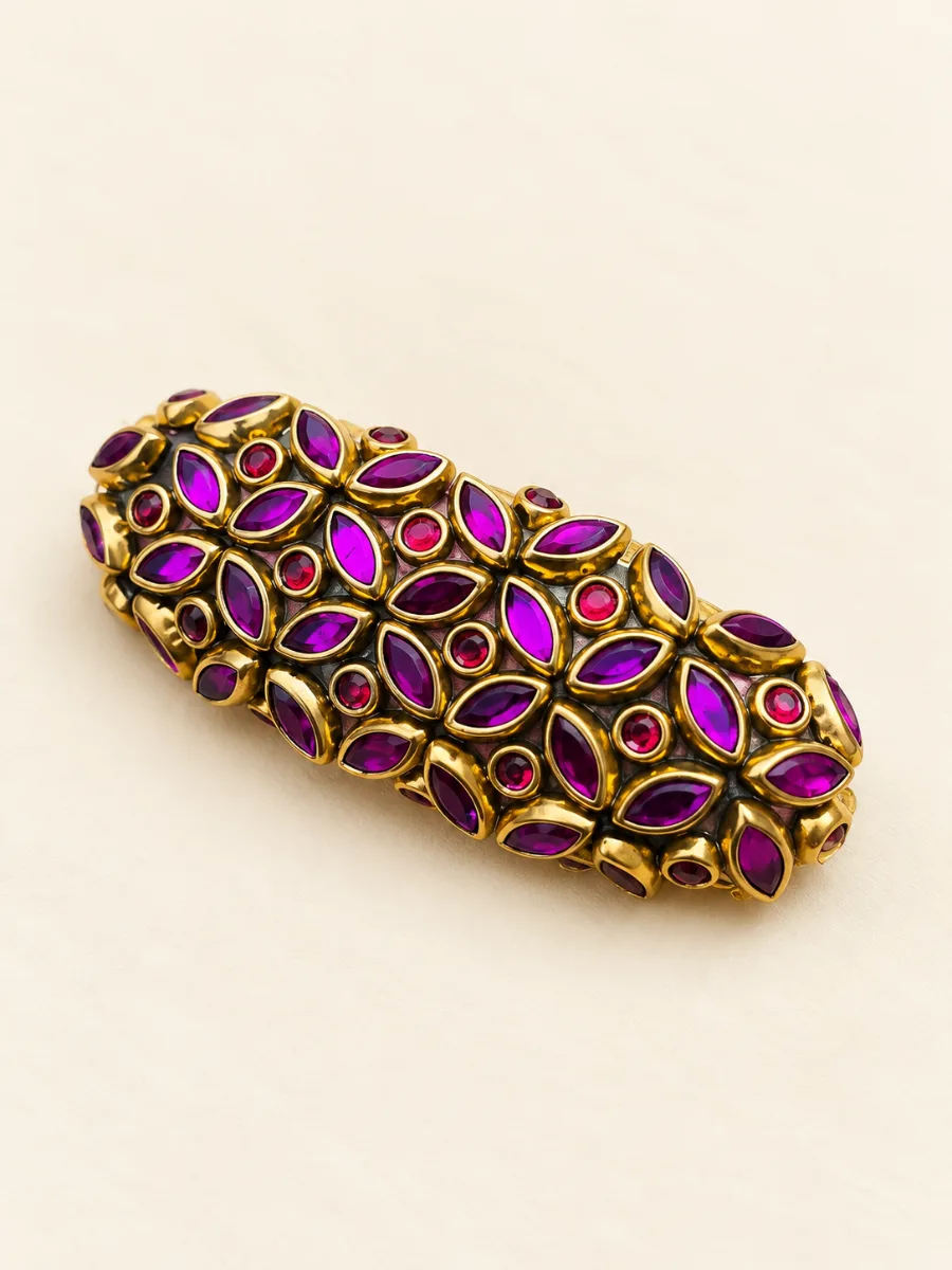 Purple & Magenta Floral Saree Pin — Beautiful handmade saree pin featuring rich purple and magenta stones with intricate floral detailing.