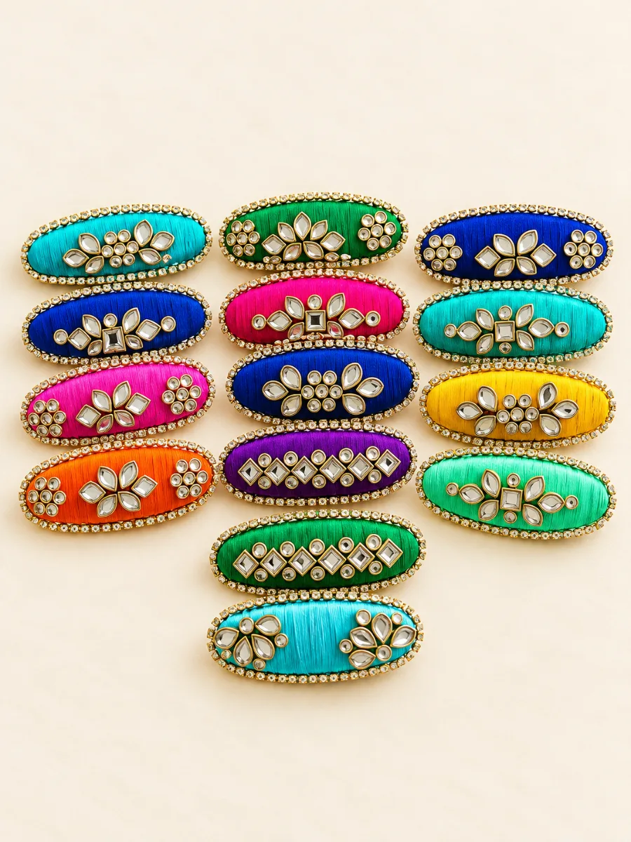Fourteen-Piece Multicolor Designer Saree Pin Set — Set of twelve colorful handmade saree pins featuring floral, geometric and stone-studded designs.